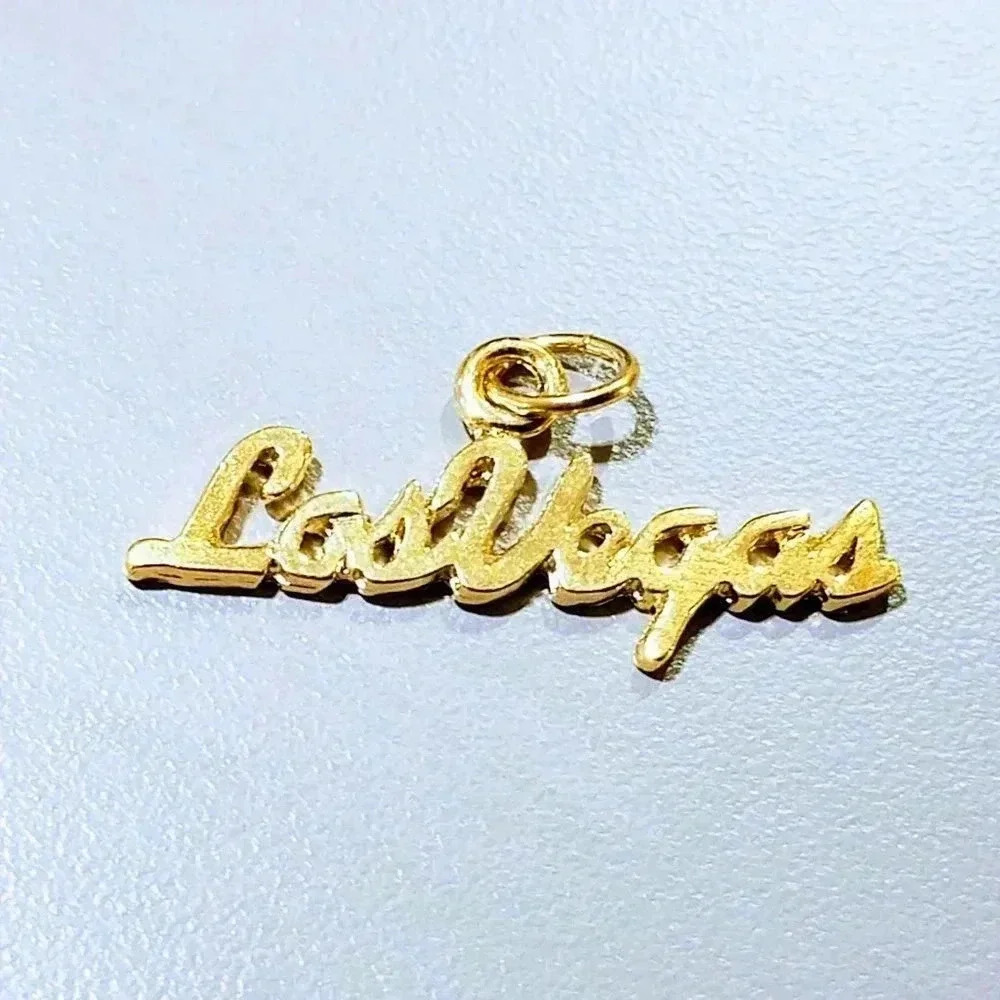 Las Vegas Charm Pendant Gold Tone Vintage Spellout